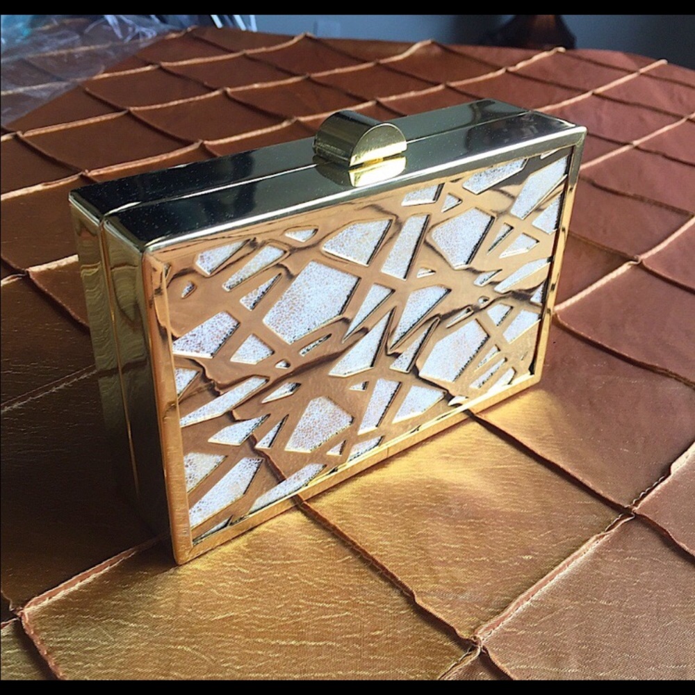 Sondra Roberts Gold Clutch Wristlet  with Gold Chain Shoulder Reflective Design